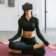 person using vr doing yoga